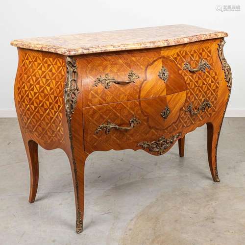 A commode with a marble top and finished with bronze in Loui...