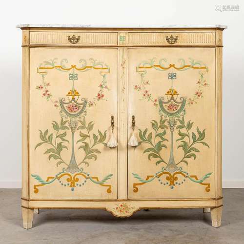 A patinated cabinet with renaissance decor and a marble top