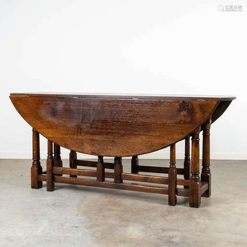 A large gateleg table, made in England.