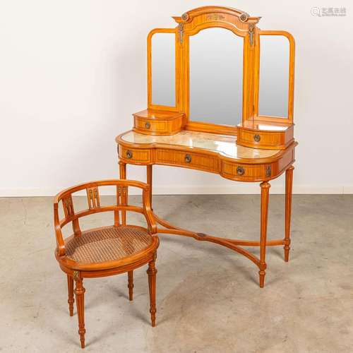 A dressing table with mirror and chair made in Louis XVI sty...