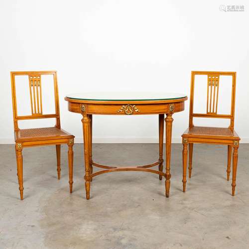 An oval table made in Louis XVI style with 2 matching chairs...