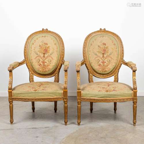 A pair of armchairs made in Louis XVI style and finished wit...