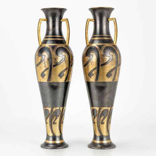 A pair of art nouveau vases, made of metal