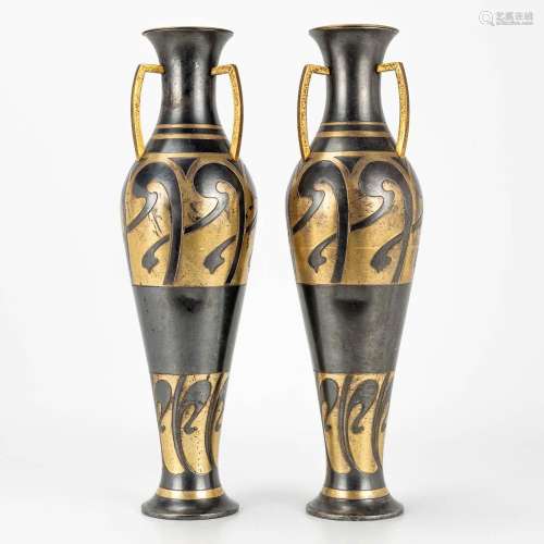 A pair of art nouveau vases, made of metal