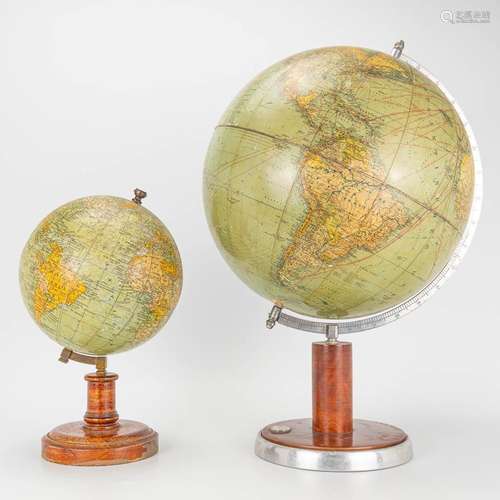 A set of 2 globes marked G. Thomas and Columbus Erdglobus