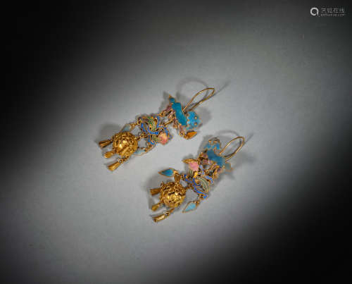 A pair of silver gilt burnt blue earrings