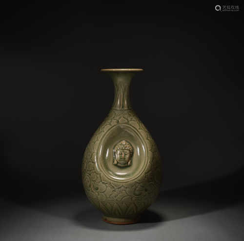 Yaozhou kiln carved Buddha statue bottle