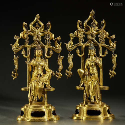 A pair of gilt bronze Buddha statues