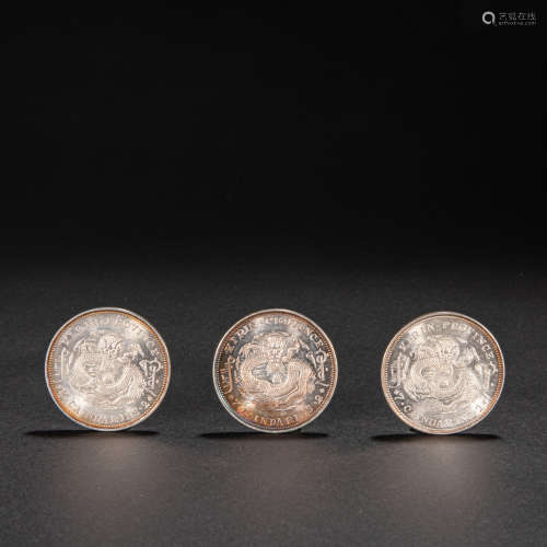 A SET OF  CHINESE SILVER COINS