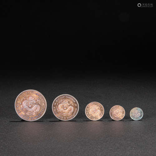 A SET OF CHINESE SILVER COINS