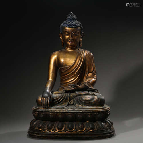 A Gilt Bronze Figure of Shakyamuni