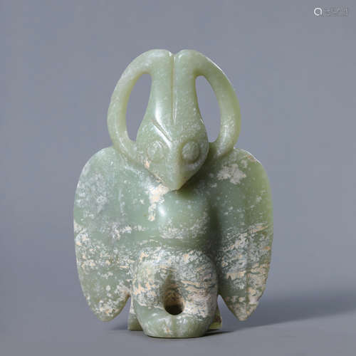 A Carved Celadon Jade Xiao,