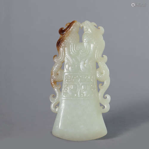 A Carved Russet Jade Twin-Phoenix Ox