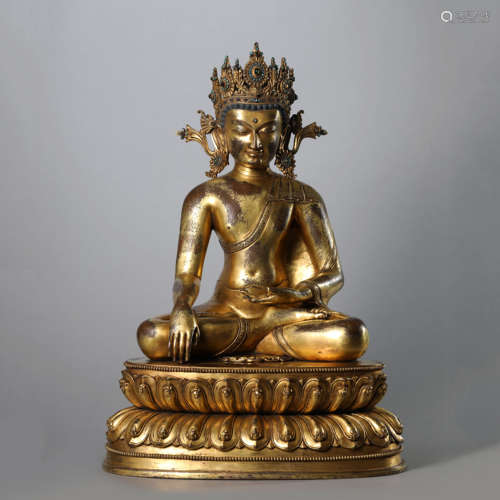 A Gilt Bronze Figure of Crowned Shakyamuni