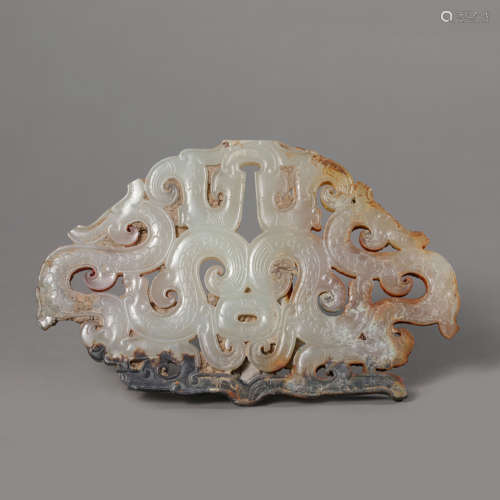 A Carved Russet Jade Dragon Pendant,