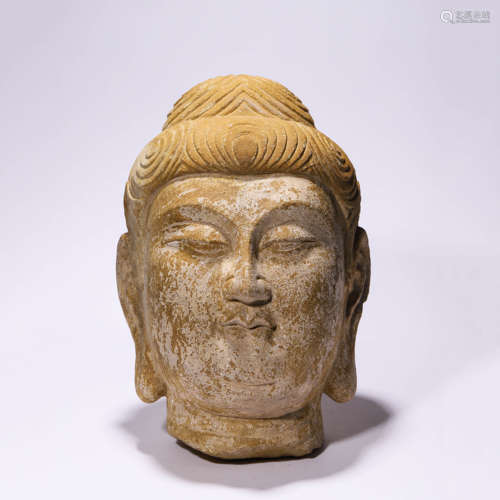 A Carved Stone Head of Buddha