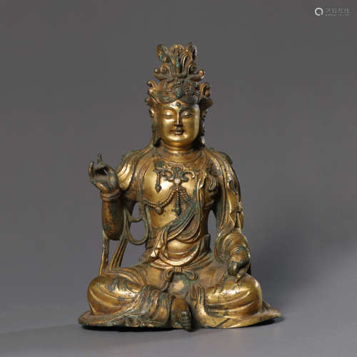 A Gilt Bronze Seated Figure of Avalokitesavara