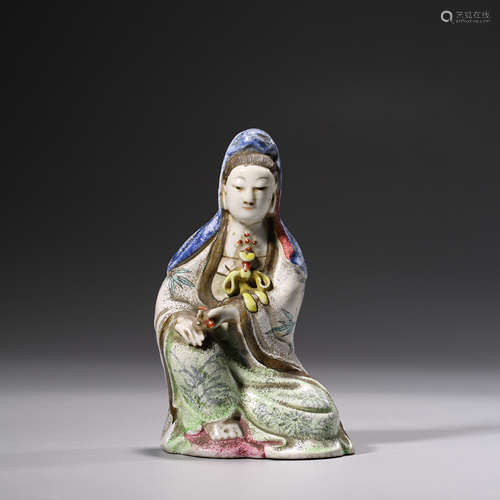 A Carved Porcelain Figurine of Guanyin