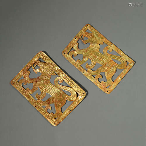 A Pair of Gold Mythical Beast Plaques