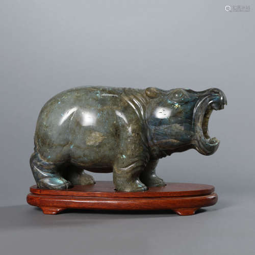 A Carved Spinach-Green Jade Hippo,