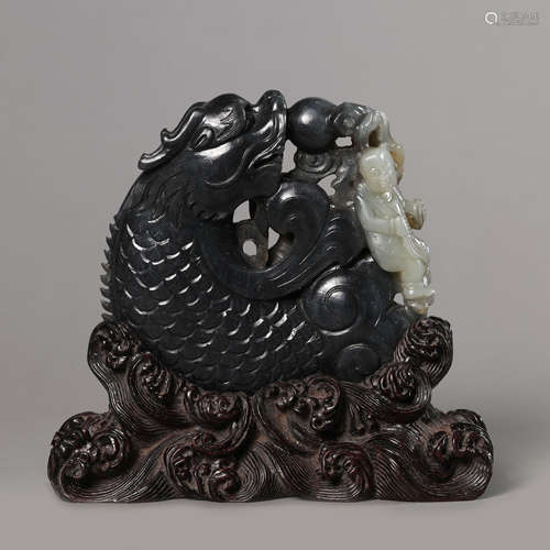 A Carved Black and Grey Jade Carp Boulder