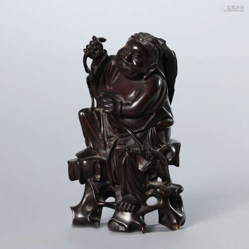 A Carved Rosewood Figure of Liuhai and His Toad