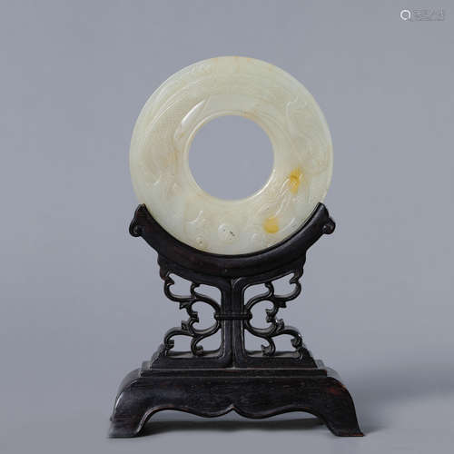 A Carved Jade Dragon Disc Bi