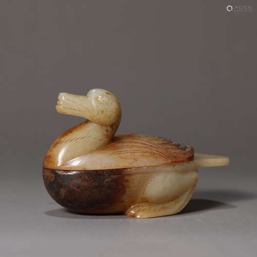 A Carved Russet and Brownish Jade Duck-Form Box and Cover