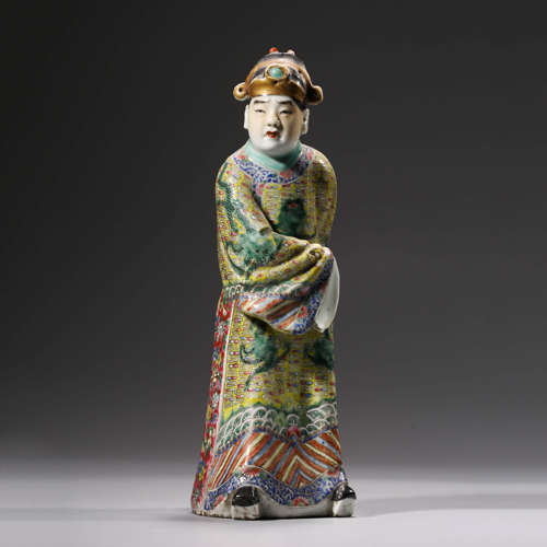 A Carved Porcelain Figurine of official