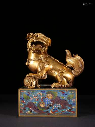 A QING DYNASTY GILT CLOISONNE LION PLAYING WITH BALL BUTTON ...