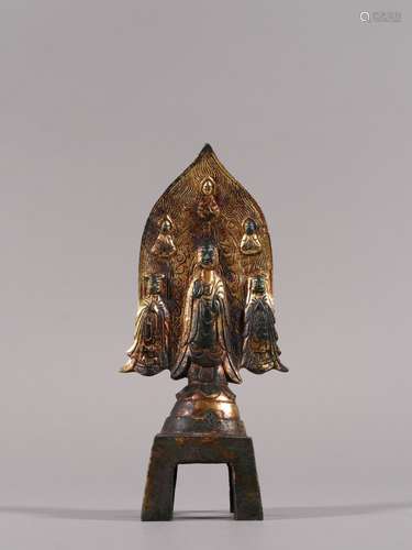 A NORTHERN WEI BRONZE GILT BENCH BUDDHA STATUE