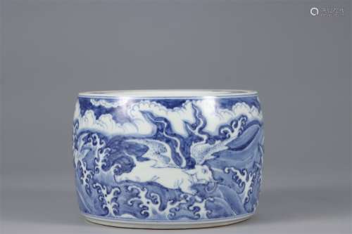 A Blue and White SEA BEAST PATTERN CRICKET TIN