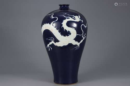 A Sacrificial blue glaze with white dragon pattern plum vase