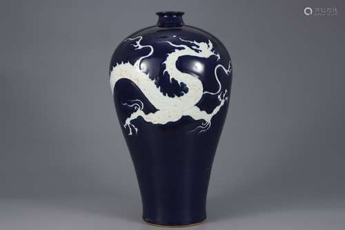 A Sacrificial blue glaze with white dragon pattern plum vase