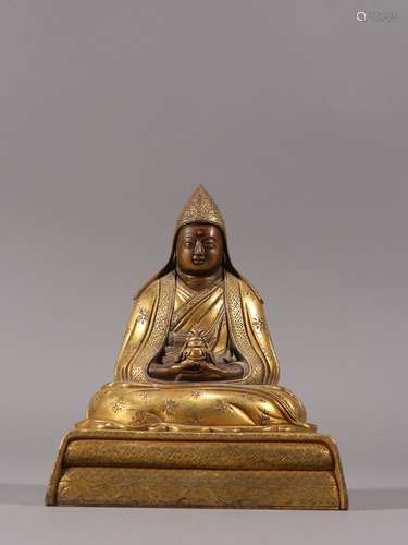 A QING DYNASTY BRONZE GILT TSONGKHAPA STATUE