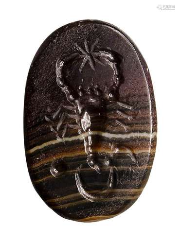 Une intaille romaine astrologique en agate bandée. Scorpion ...