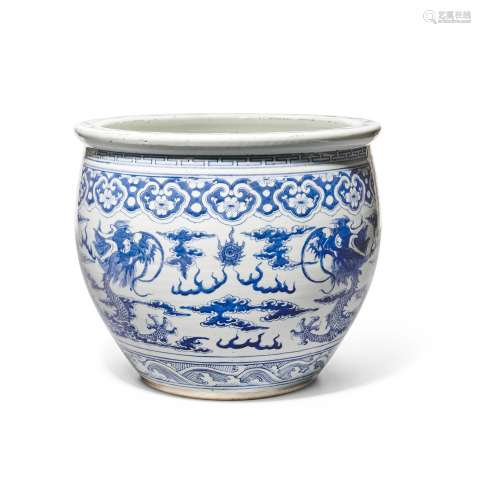 A BLUE AND WHITE DRAGON JARDINIERE