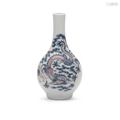 A blue and copper red dragon vase