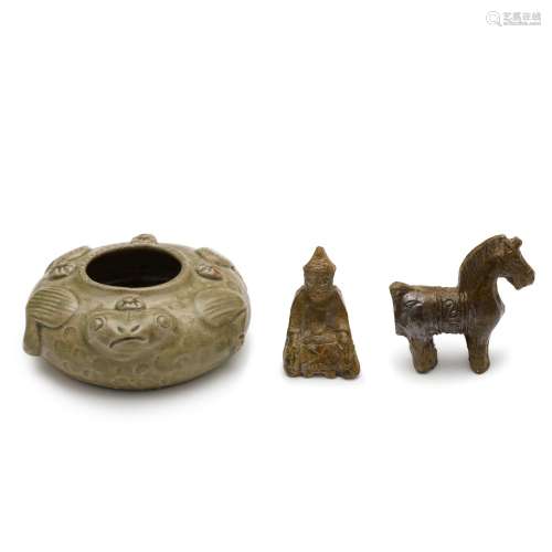 Two Green-glazed small pottery figures of a horse and a man;...