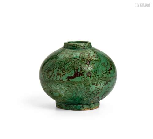 A green-glazed marbled jar