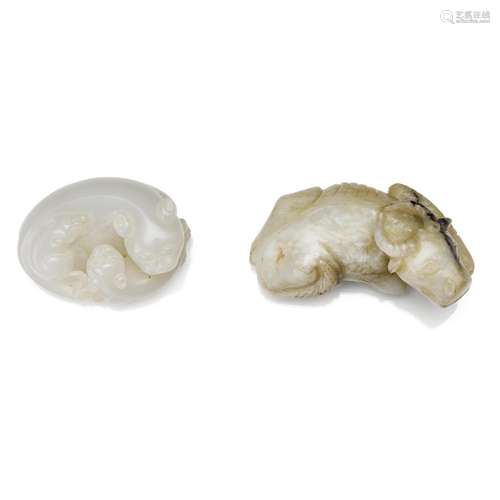 A grey jade recumbent buffalo and a  white Jade 'three cats'...