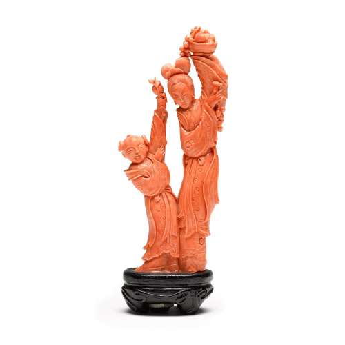 A carved coral figural group