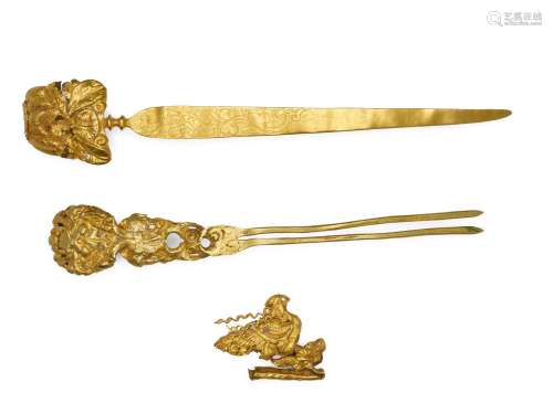 Three gold hair pins