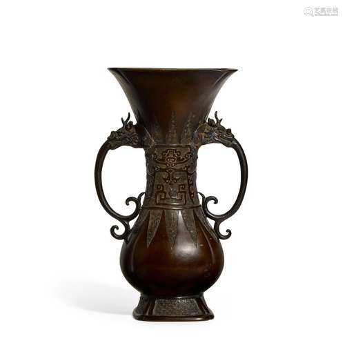 An archaistic coppery-bronze lobed pear-shaped vase