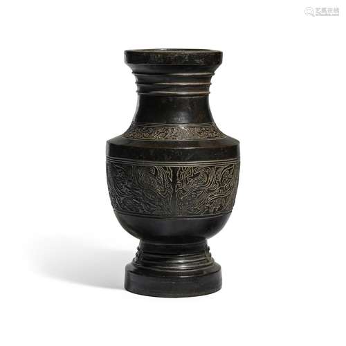 An archaistic bronze baluster vase