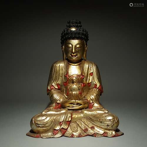 A WOOD GILT BUDDHA