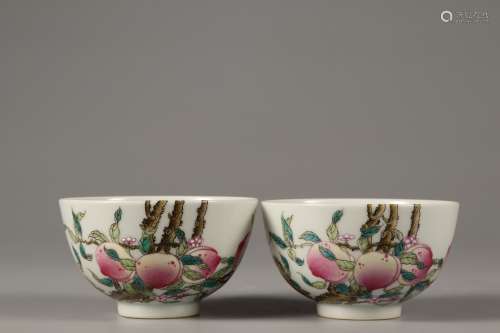 A PAIR OF FAMILLE ROSE PEACH CUPS