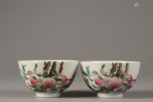 A PAIR OF FAMILLE ROSE PEACH CUPS