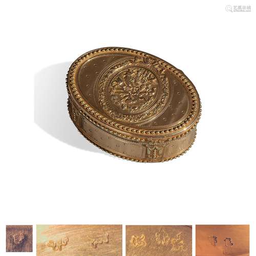 Oval snuff box in chased gold, Paris 1780