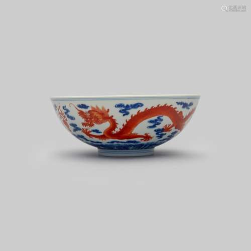 An iron-red enammelled and underglaze blue 'dragon' bowl